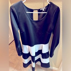 Classic Long Sleeve Fit & Flare Black and White Dress w Keyhole Back Detail